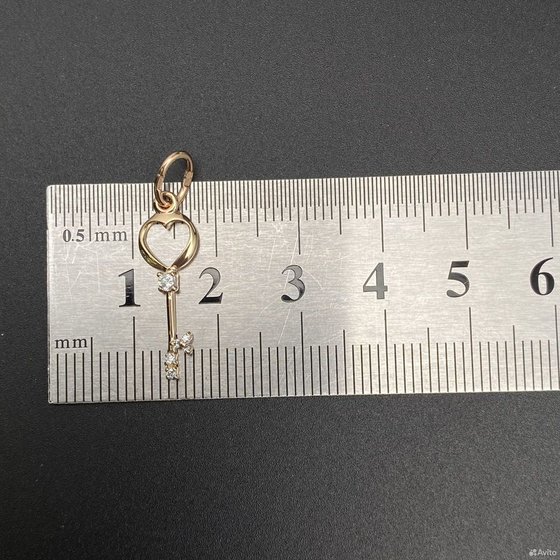 Золотая подвеска с камнями 375пр. вес: 0,55гр